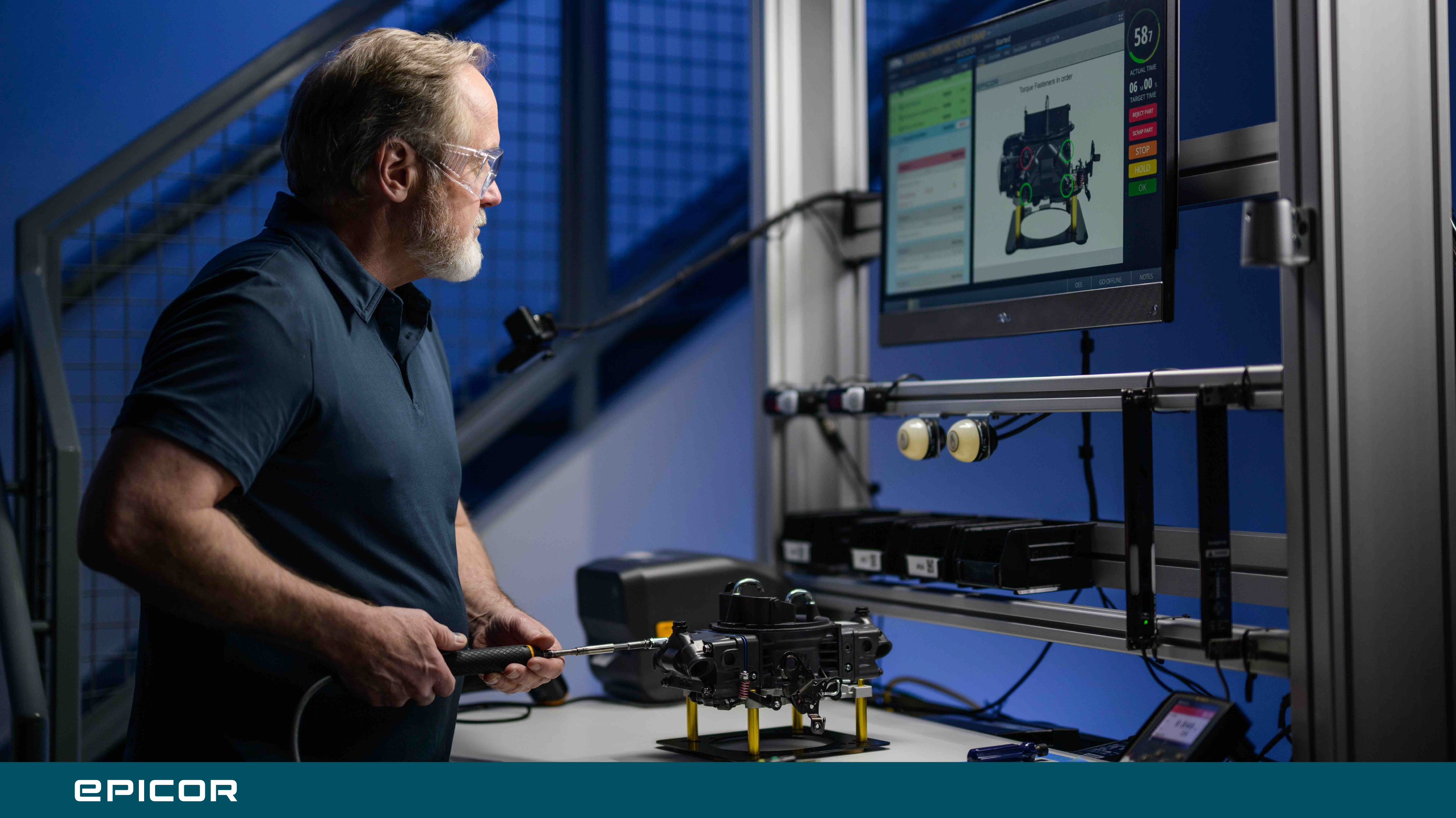 Operator viewing digital work instructions for assembly