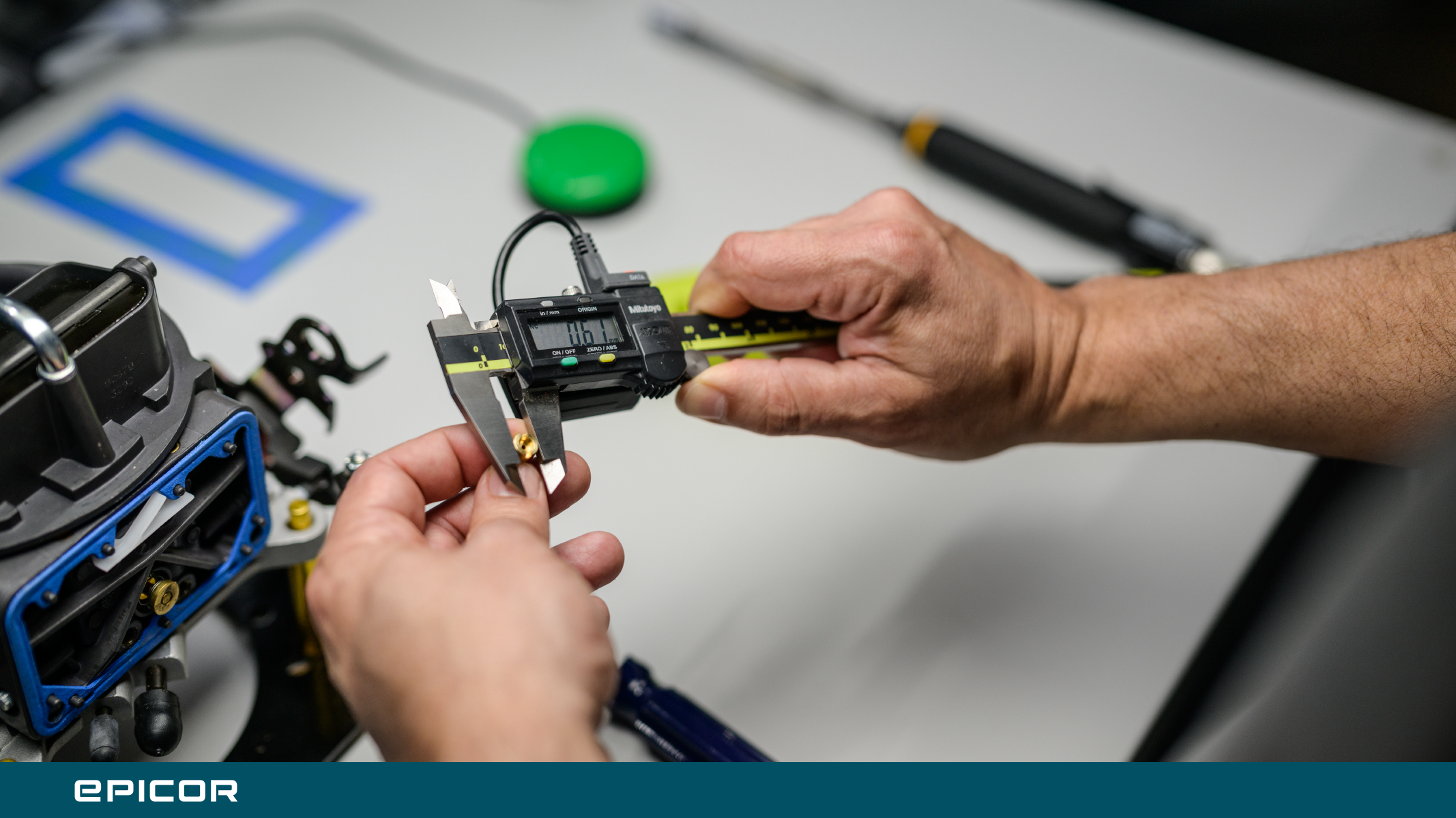 Manufacturing operator gauging a part with connected device