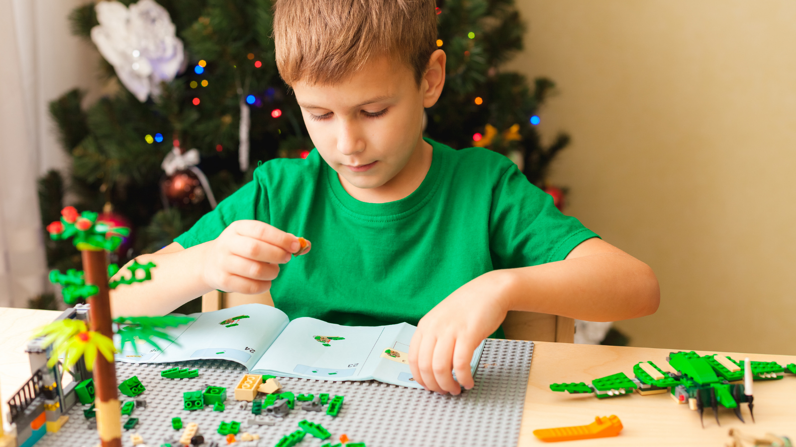 Child following lego instructions